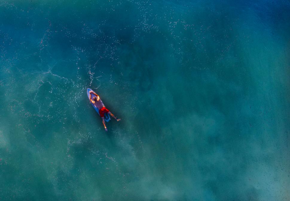 Free Image of Lone Surfer Waiting for a Wave - Aerial View 