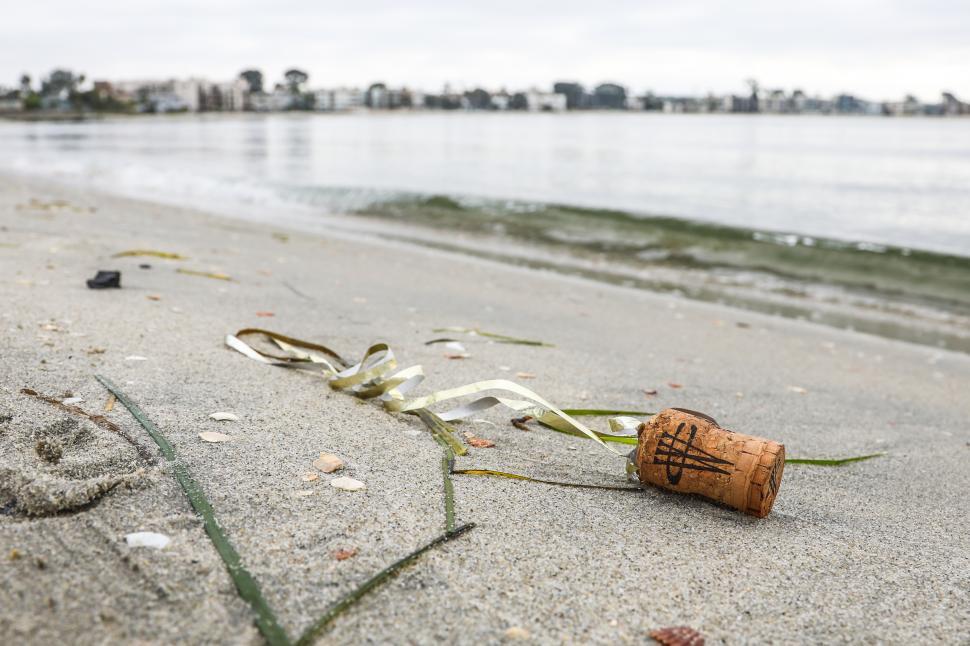 Free Image of Champagne Cork on the Beach 