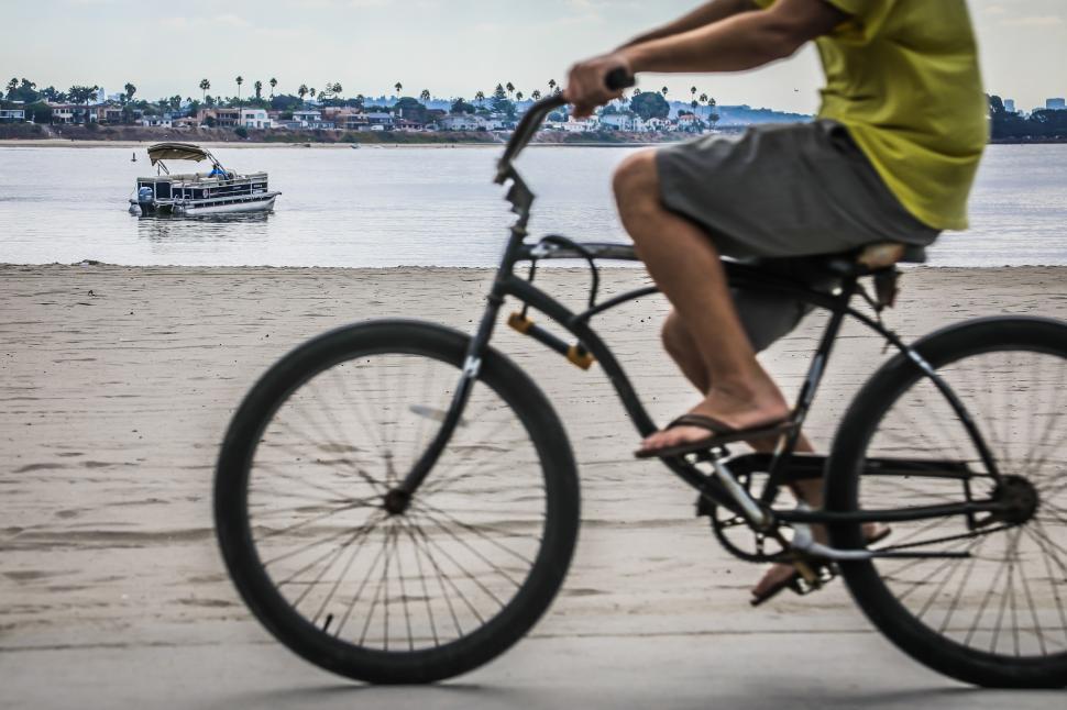 Free Image of Cyclist along the beach 