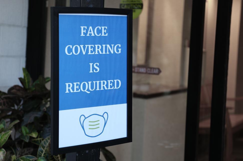 Free Image of Sign Says Face Coverings Required 