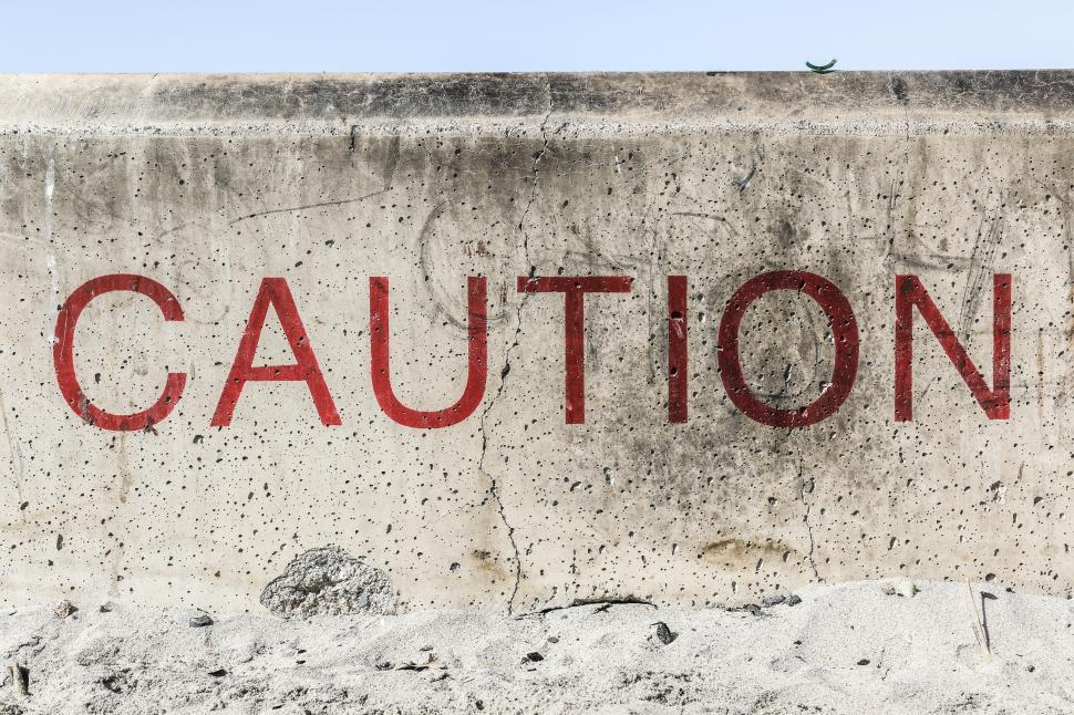 Free Image of CAUTION in red paint 