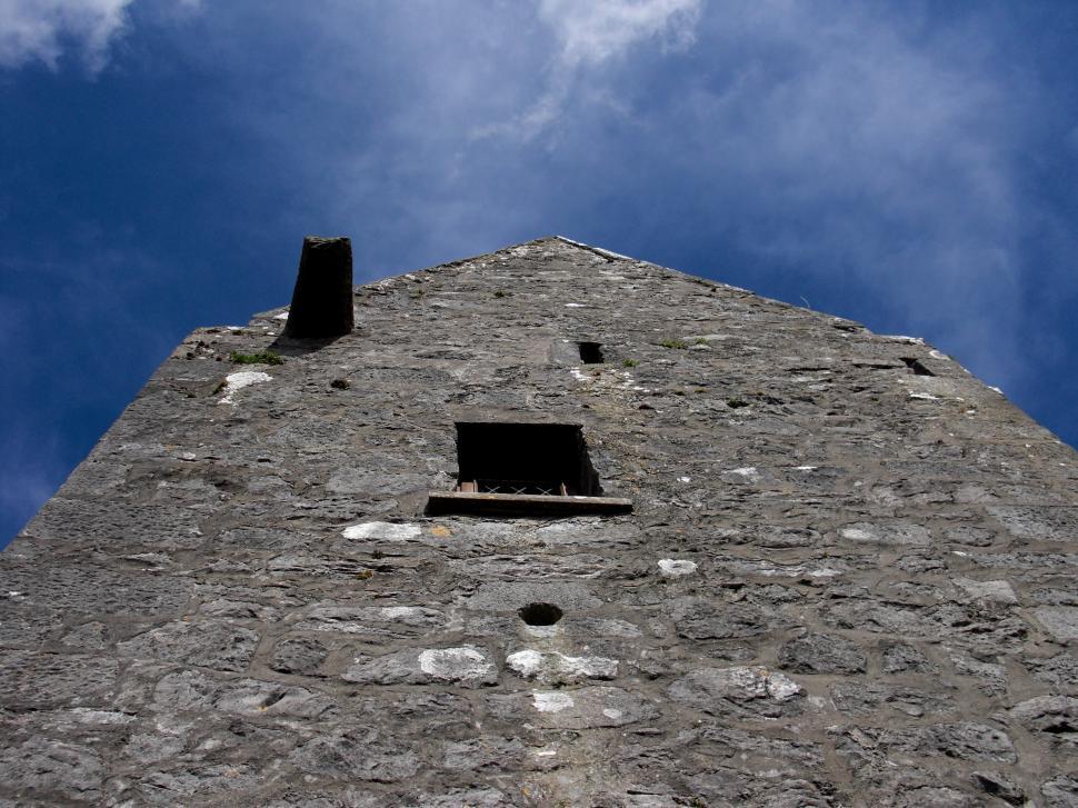 Free Image of Tower With Clock Perched on Side 