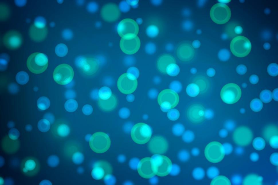 Free Image of Bokeh - Blue and Green Circles on Dark Blue Background 