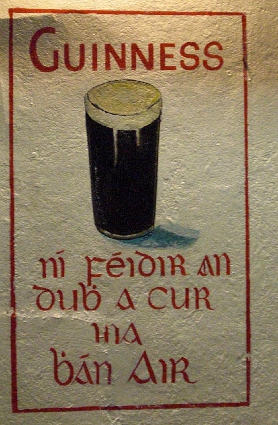 Free Image of Sign Featuring Picture of Pint of Guinness 