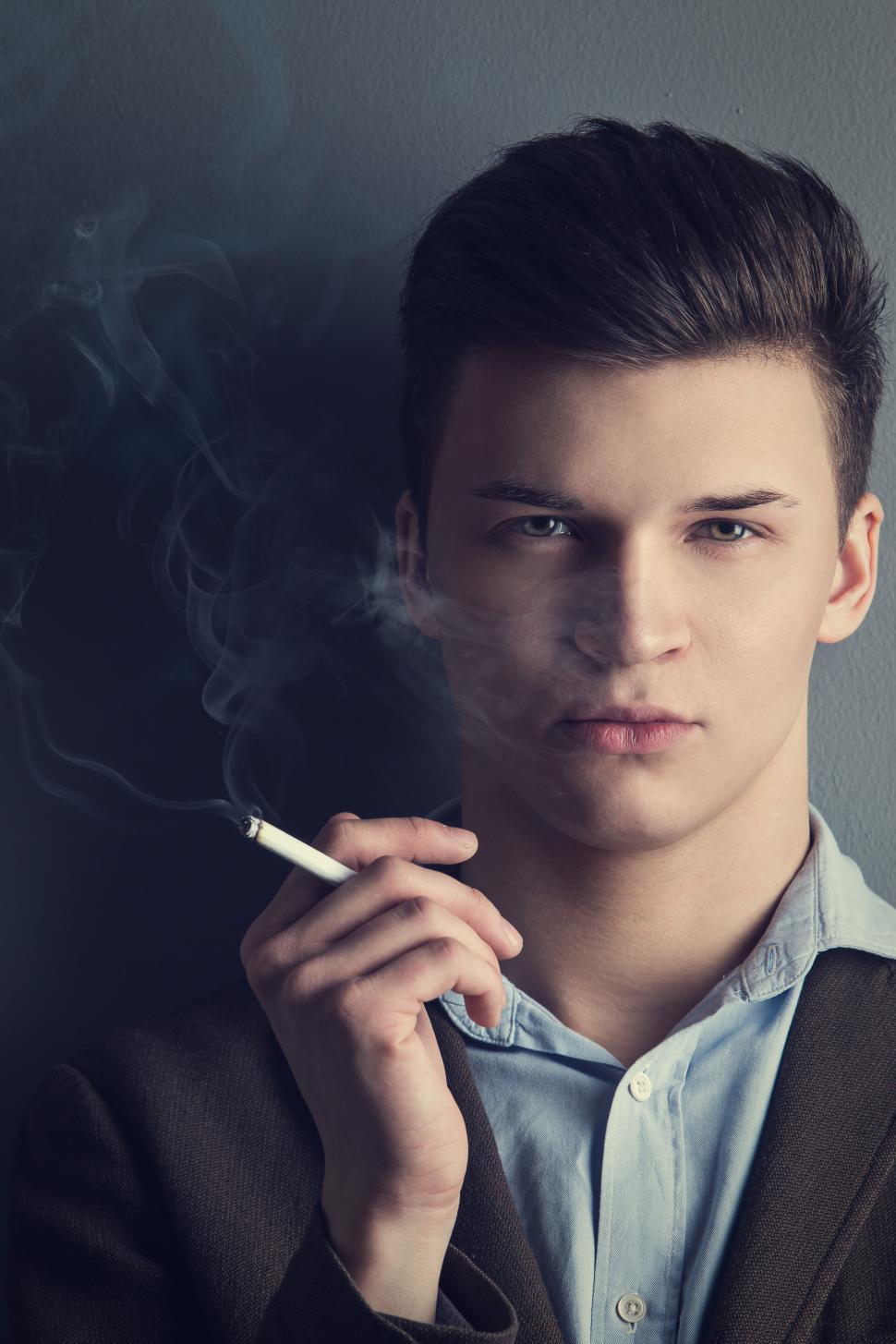 Free Image of Handsome man with cigarette 