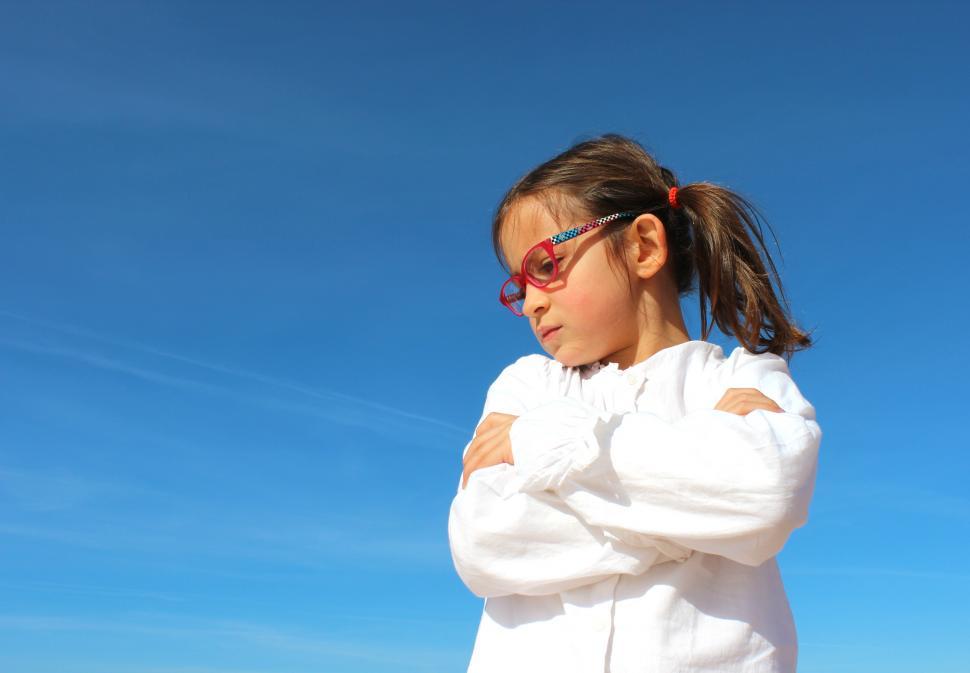 Free Image of Little Girl with Arms Crossed - Disagreement - Sulking - Anger 