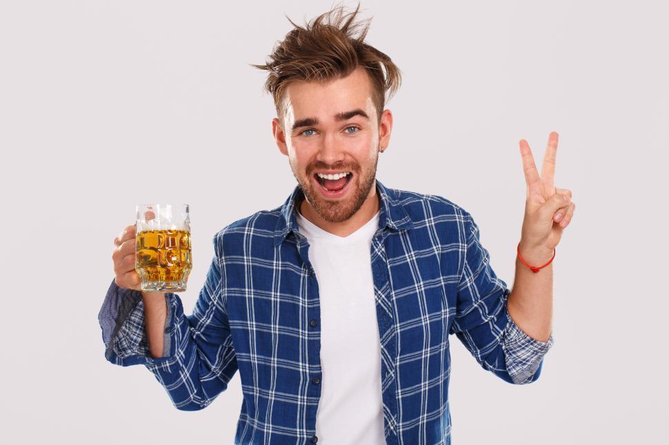 Download Free Stock Photo of Alcohol. Messy drunk guy holding a beer. 