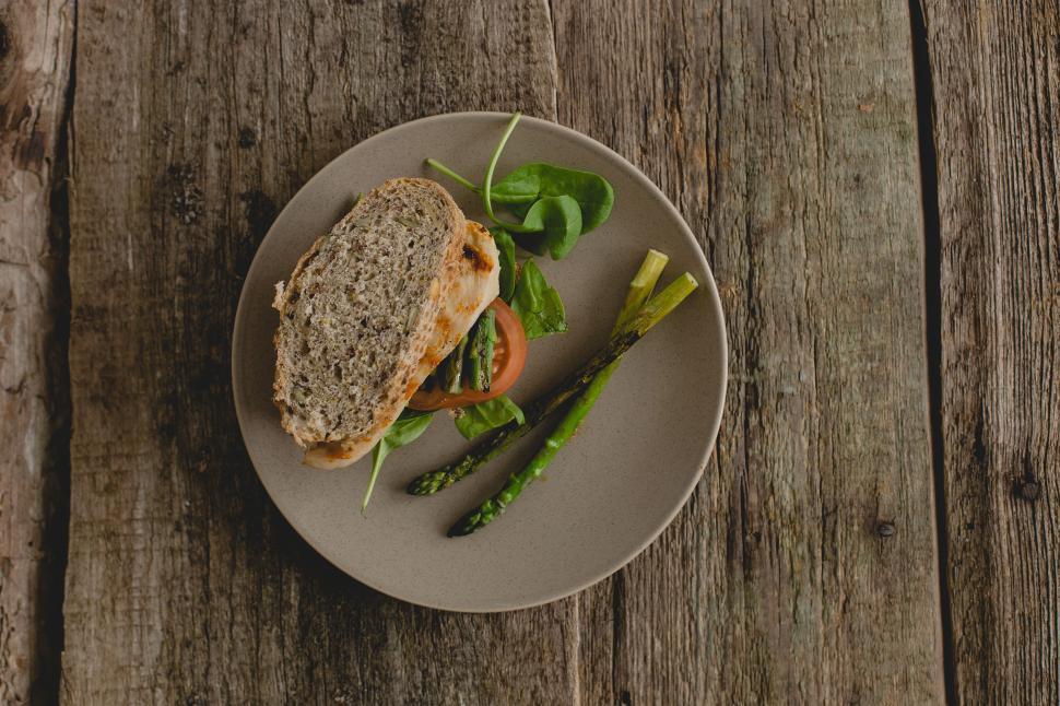 Free Image of Sandwich on the dark wooden table 