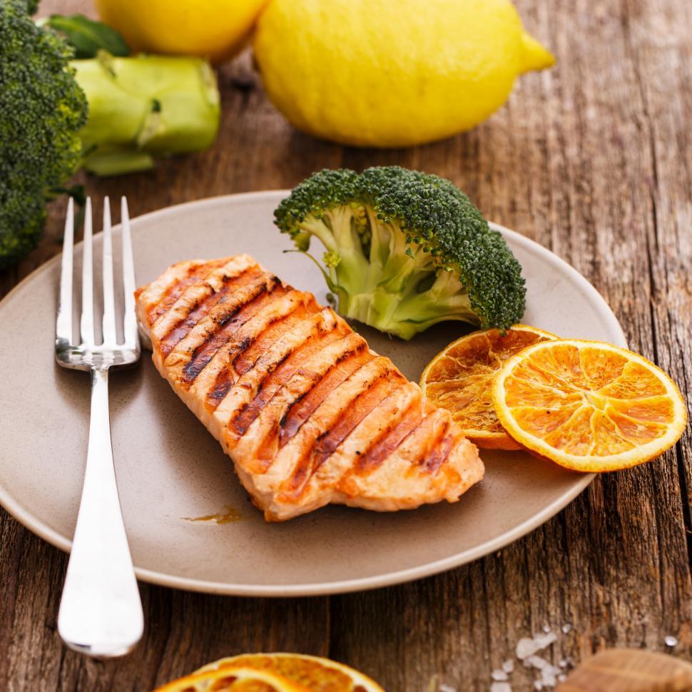 Free Image of Slice of grilled salmon with garnish  