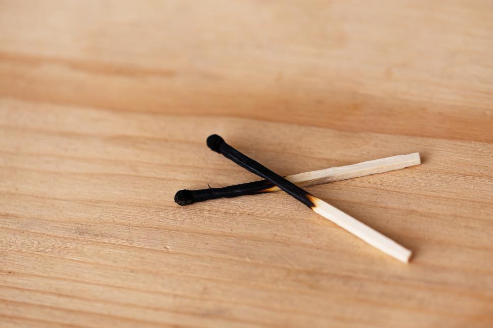 Free Image of two matchsticks, burned 
