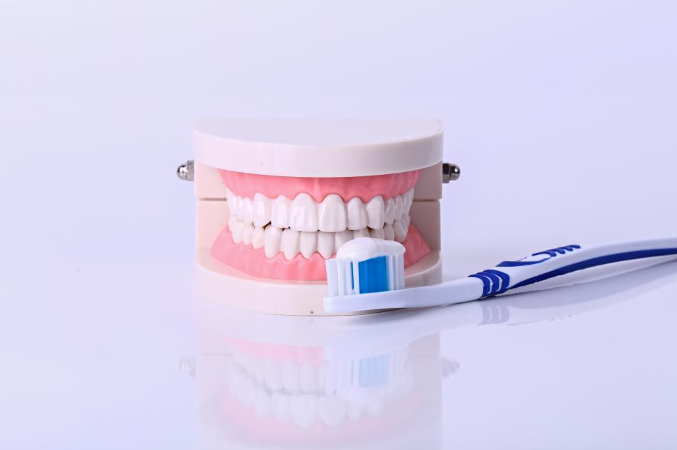 Free Image of White teeth, toothpaste and toothbrush. Dental Care. 