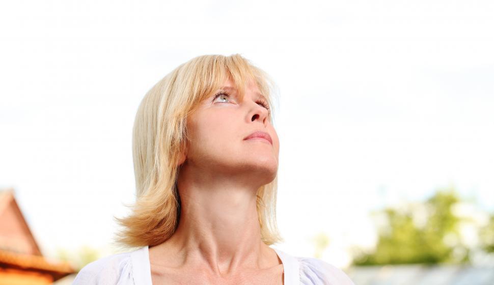 Free Image of Middle aged woman over sky background 