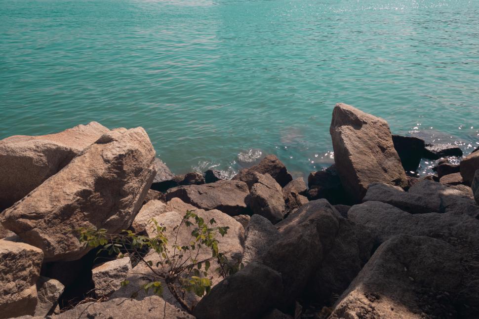 Free Image of A View of a Body of Water From a Rocky Shore 