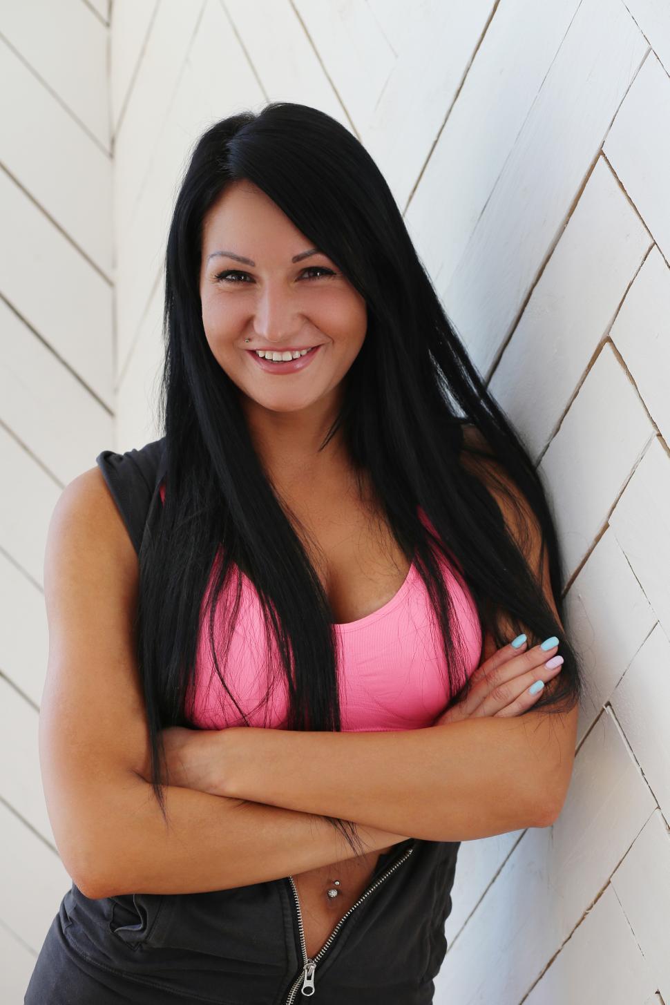 Free Image of Dark haired woman in workout gear 