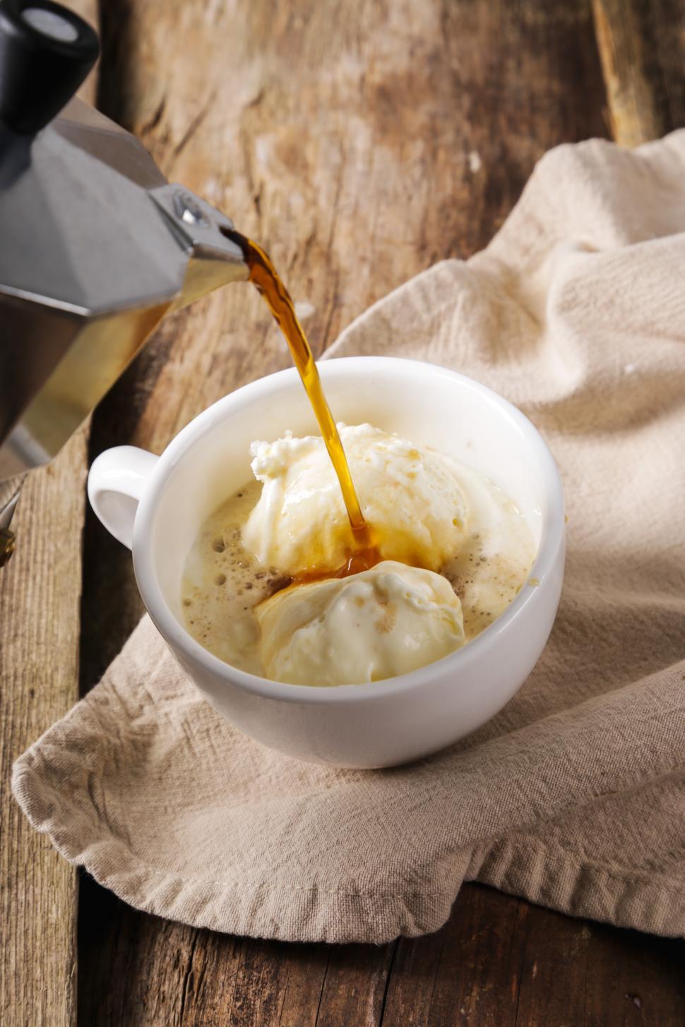 Free Image of Affogato - Pouring Coffee over Ice Cream 