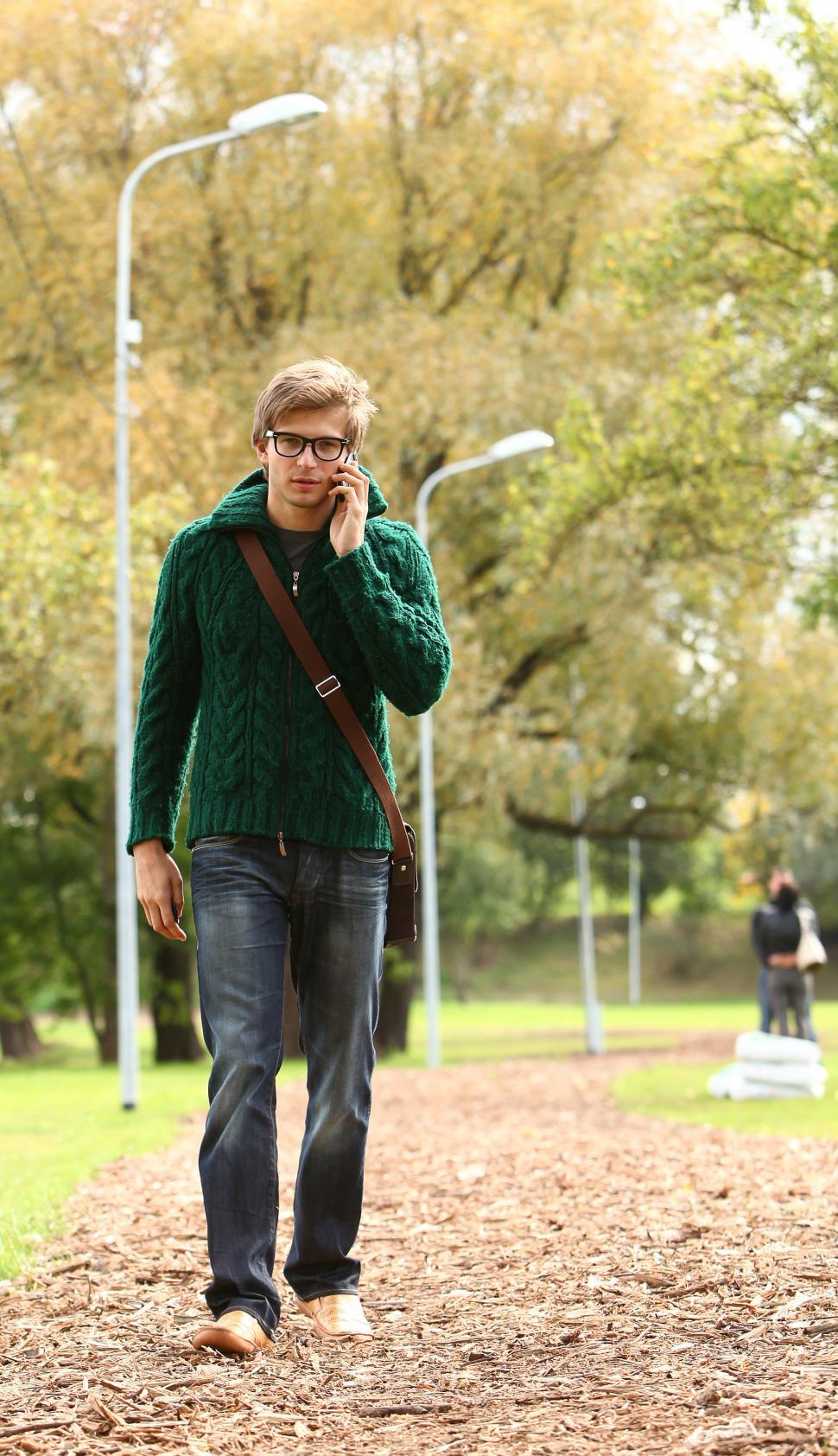 Free Image of Man in the park on the phone 