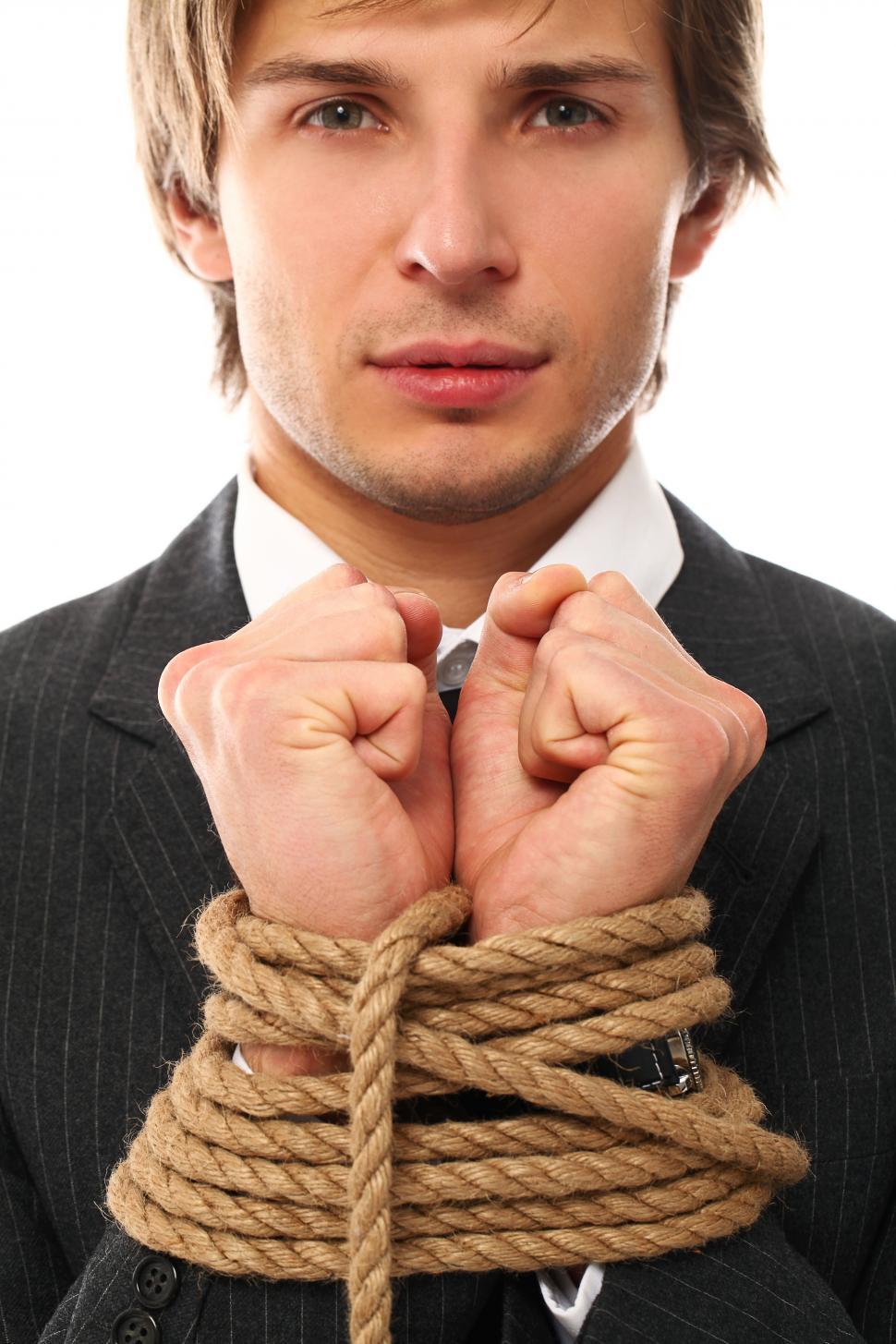 Free Image of Businessman with hands tied 