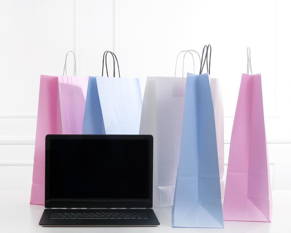 Free Image of Shopping bags and a computer - ecommerce 