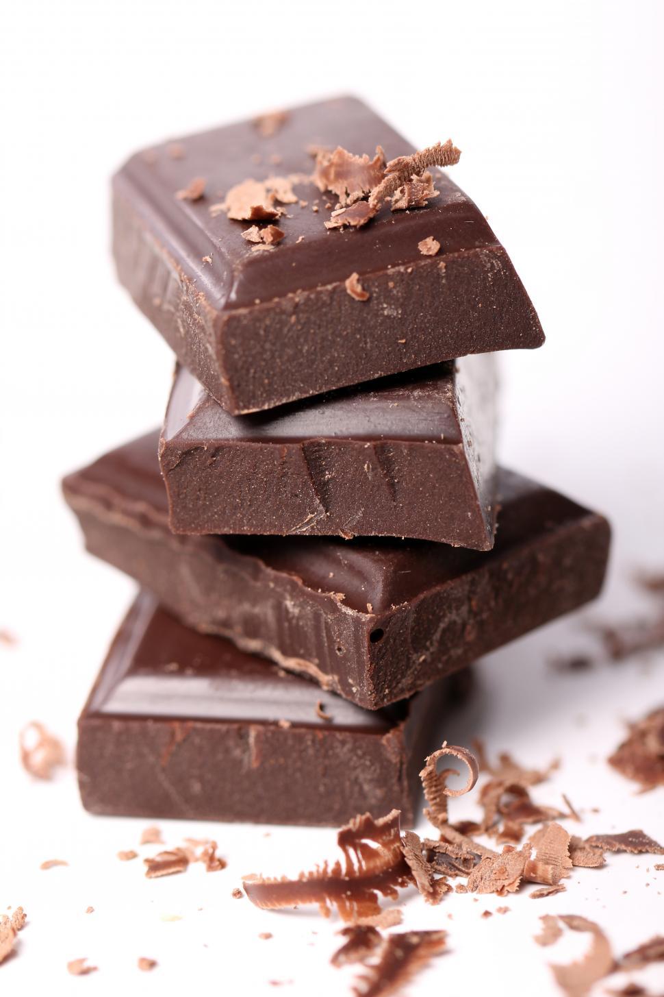 Free Image of Pieces of dark chocolate stacked 
