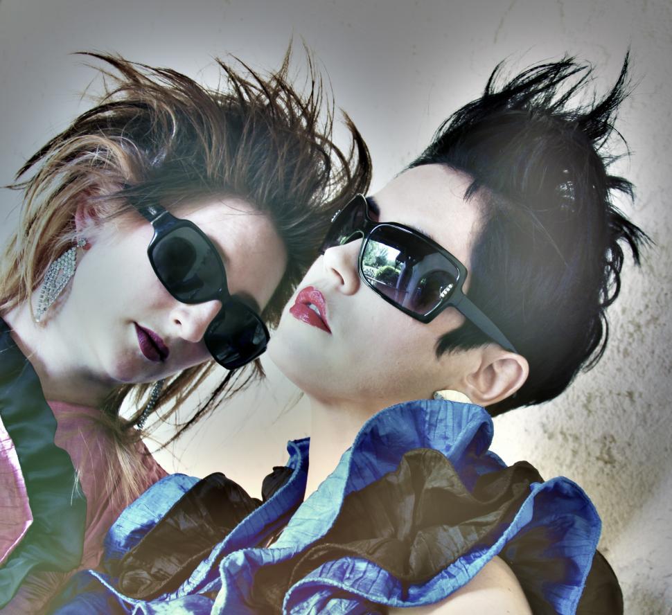 Free Image of Two female fashion models with spiked hair style during photosho 