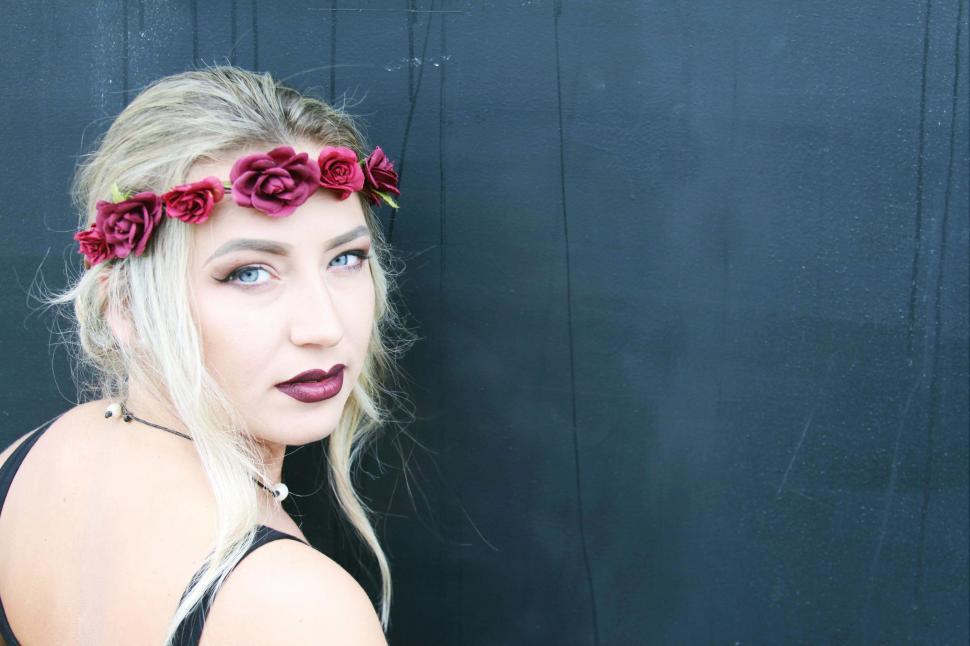 Free Image of Female fashion model with red lips and rose crown - looking at c 