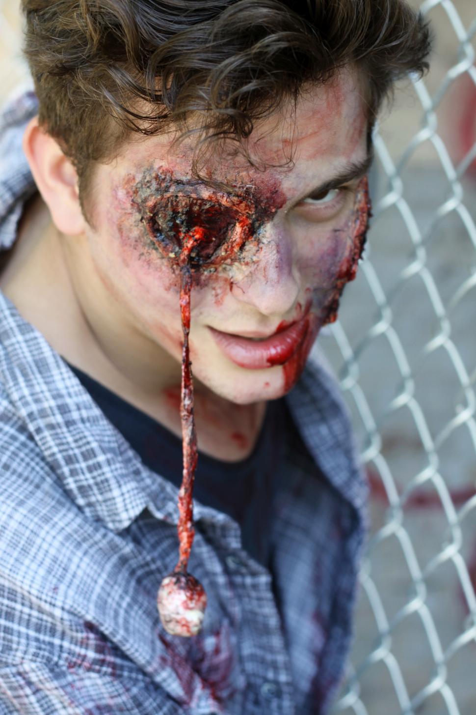 Free Image of Man with zombie scary eyeball - halloween makeup 
