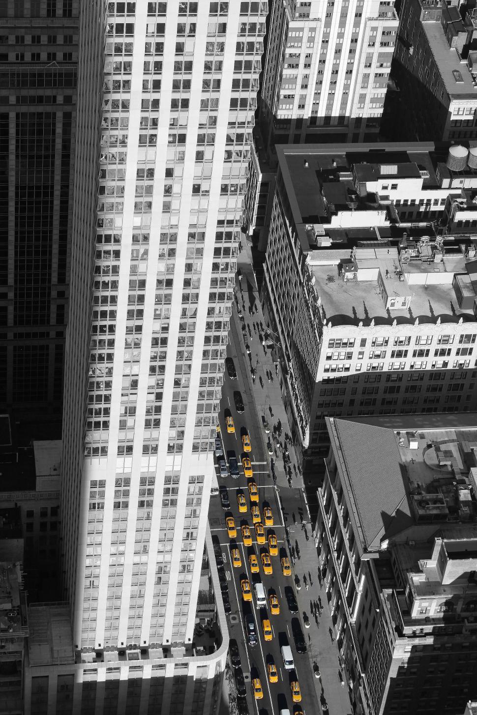 Free Image of Skyscrapers and road with taxis from above 