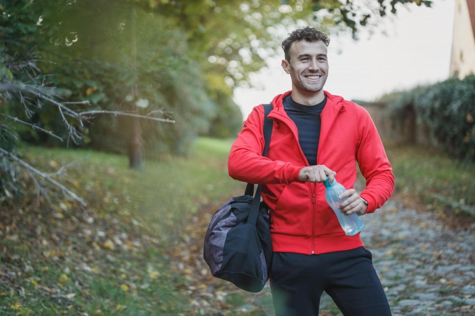 Free Image of Male athlete with bag in the park 
