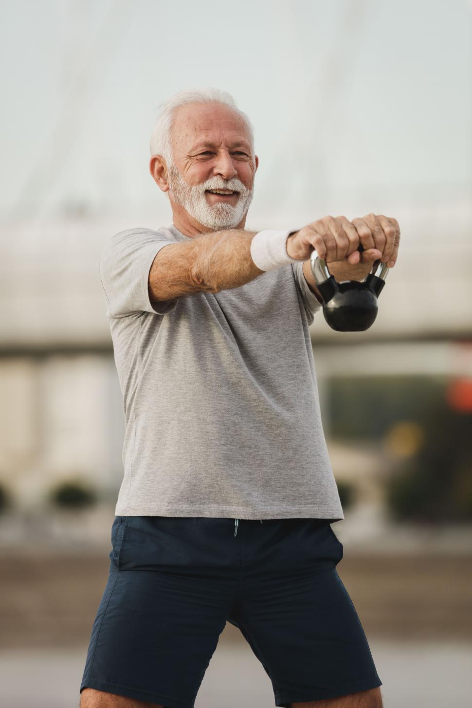 Free Image of Senior old man with dumbbell 