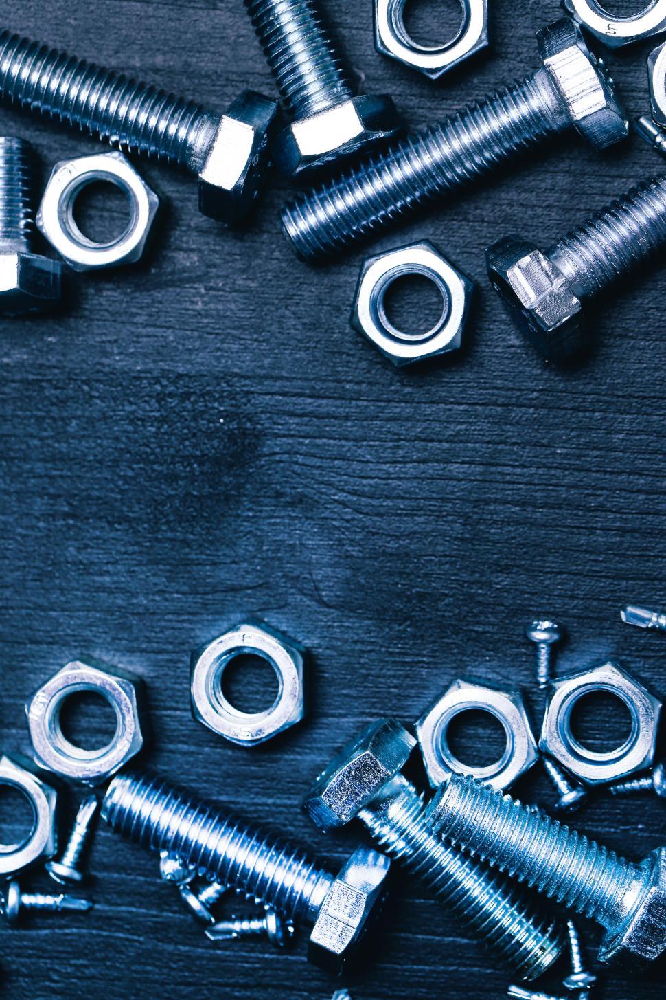 Free Image of Bolts and nuts frame copyspace 