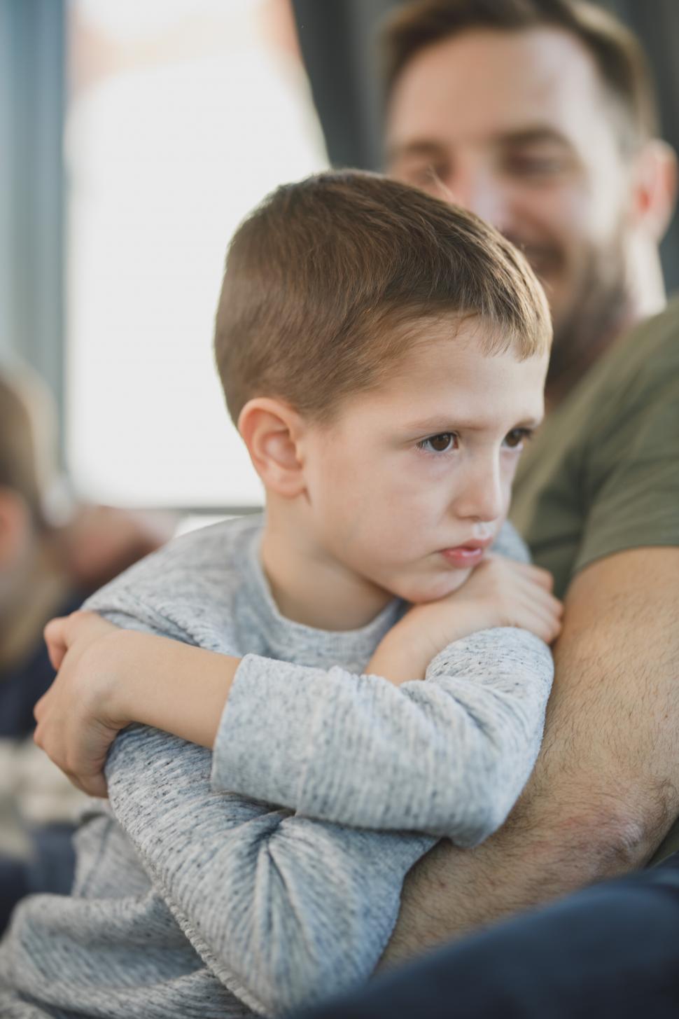 Free Image of Unhappy boy with his father 