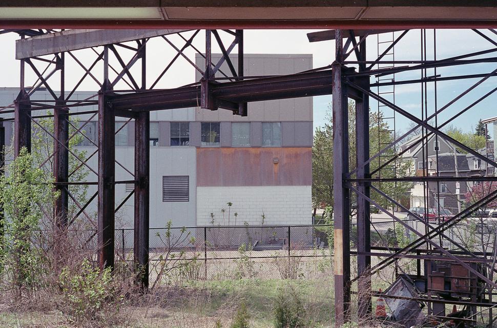 Free Image of Abandoned industrial building in the meadow 