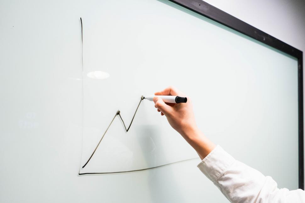 Free Image of Businessman putting his ideas on white board 