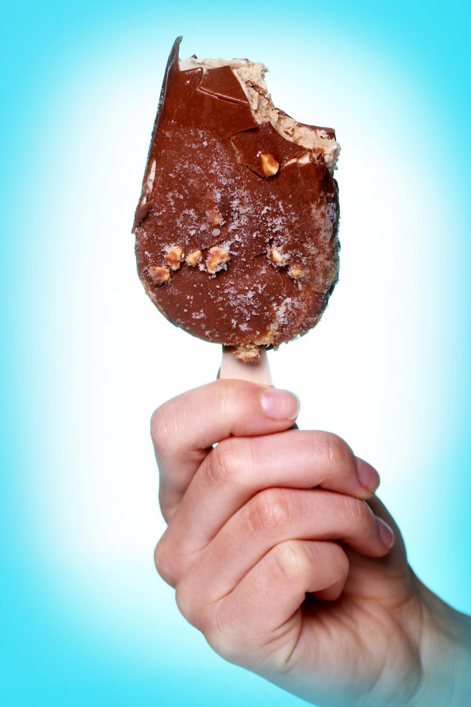Free Image of Fresh chocolate ice cream bar with bites missing 