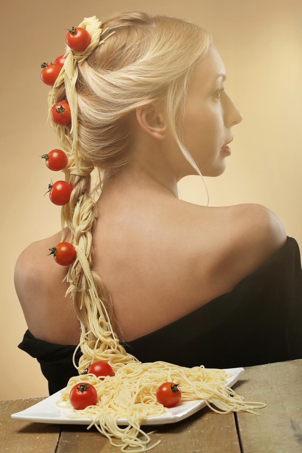 Free Image of Woman with pasta braid down her back. 