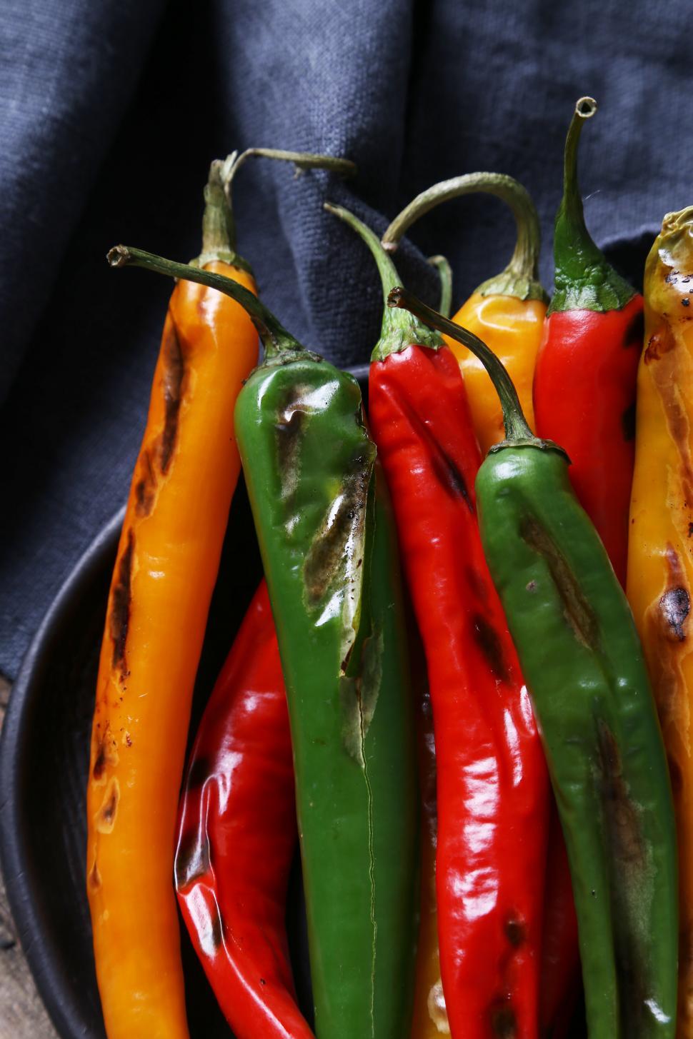 Free Image of Roasted chili peppers, red, yellow and green 