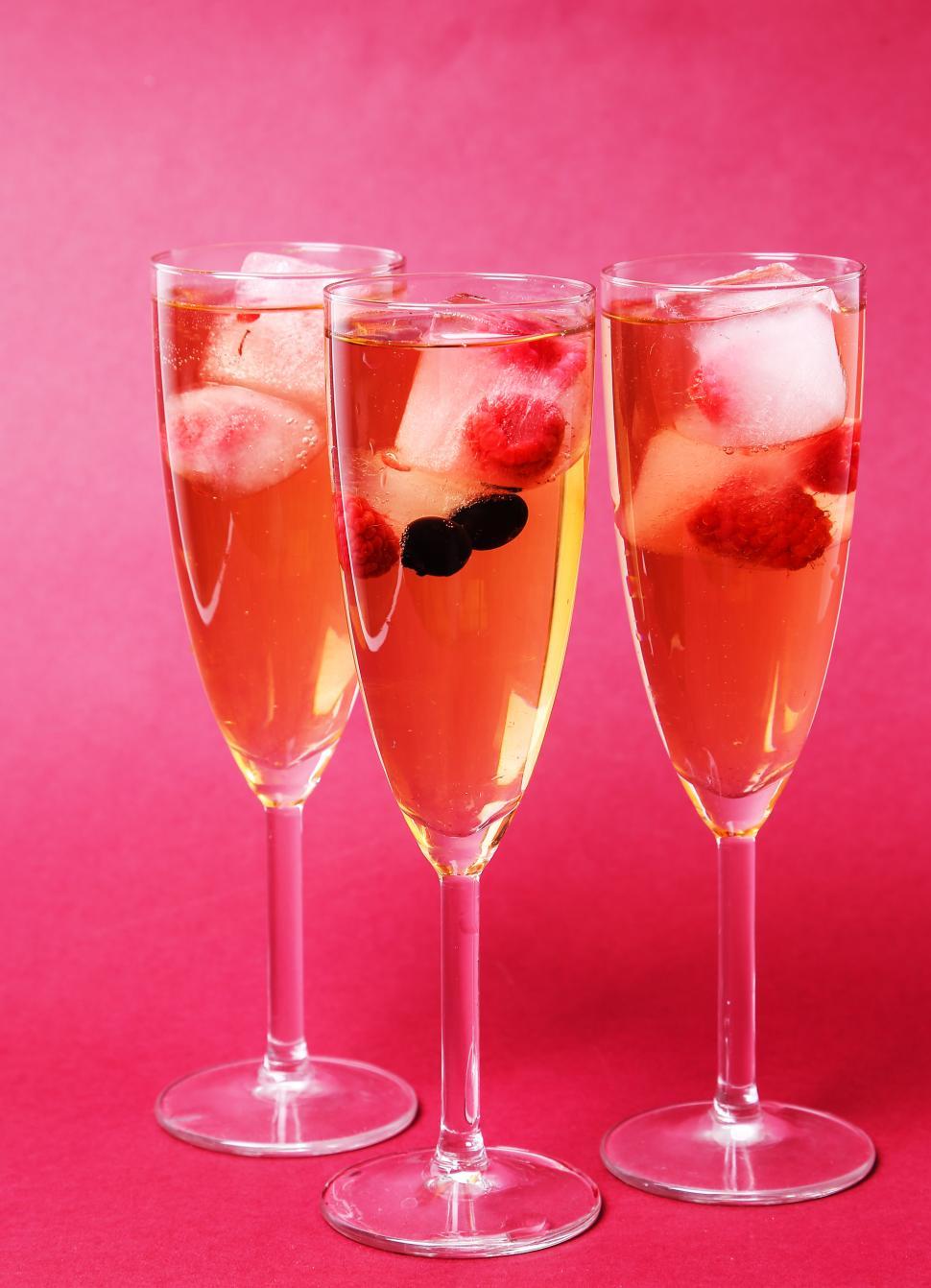 Free Image of Glasses of champagne with fruit cubes 