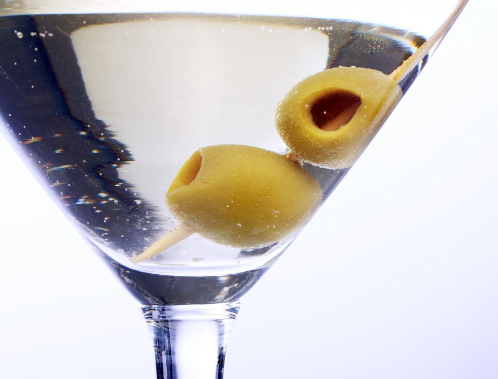 Free Image of Martini cocktail with olives inside 