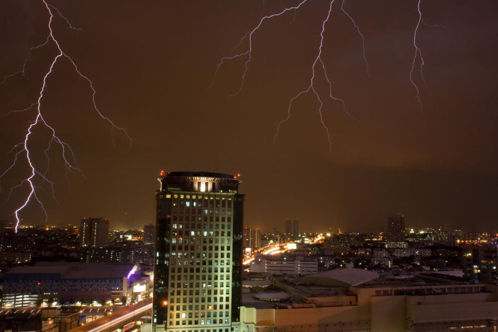 Free Image of Lightning strike over the city 