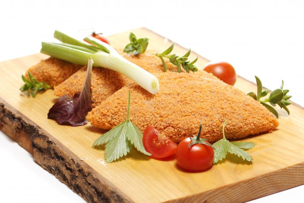 Free Image of Breaded cutlets on a board 