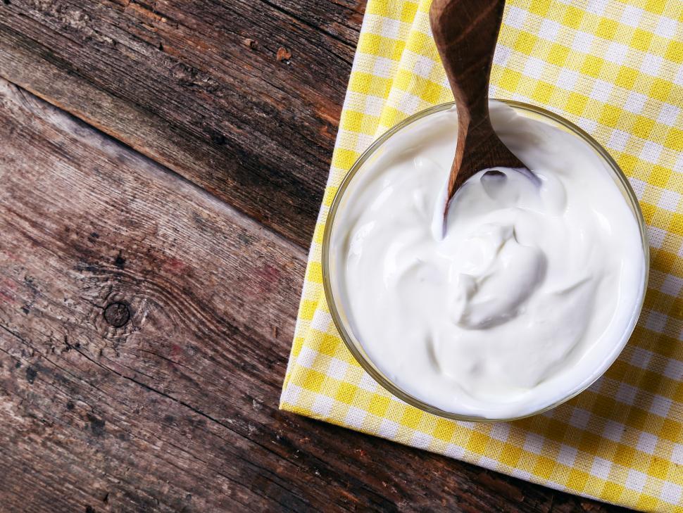 Free Image of Bowl of Greek yogurt with a spoon 