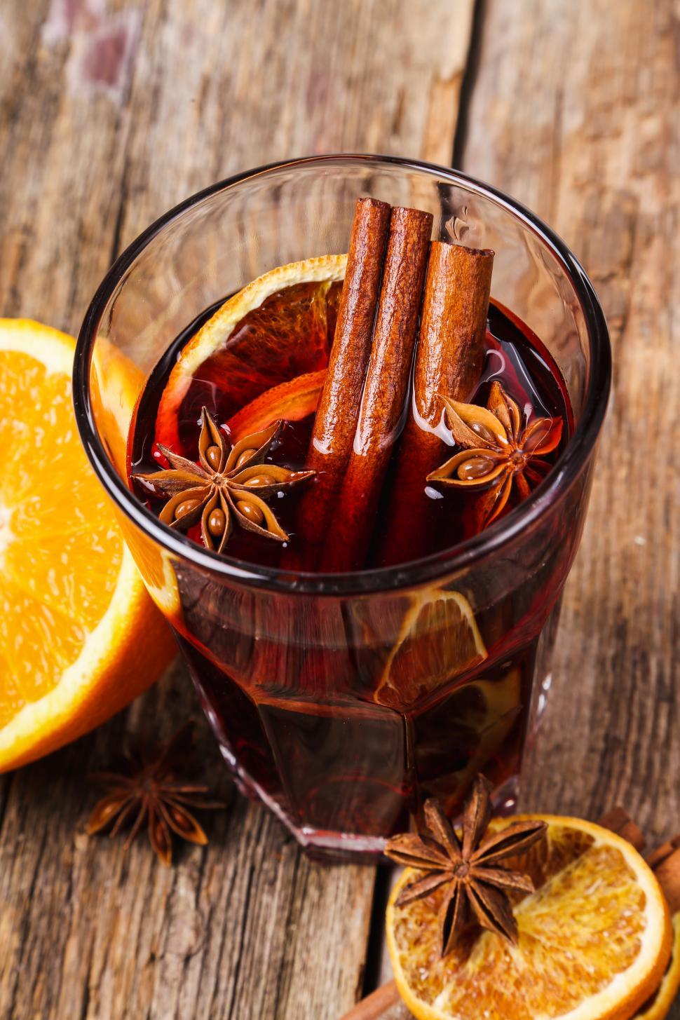 Free Image of Cinnamon with orange and star anise in mulled wine 