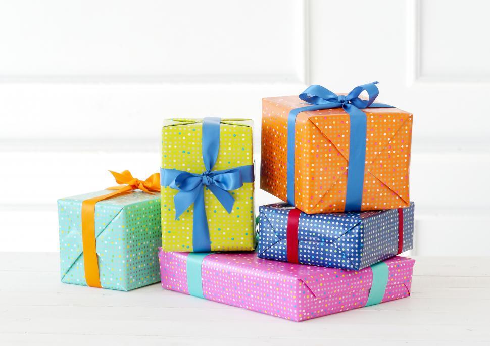 Free Image of Colorfully Wrapped Gifts on a Table 