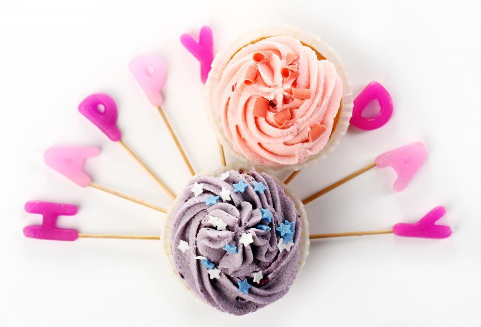 Free Image of Birthday cupcakes with colorful letter candles 