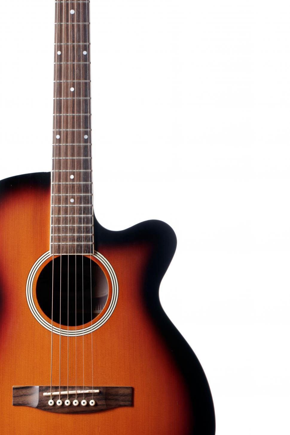 Free Image of Classic acoustic guitar on white background 