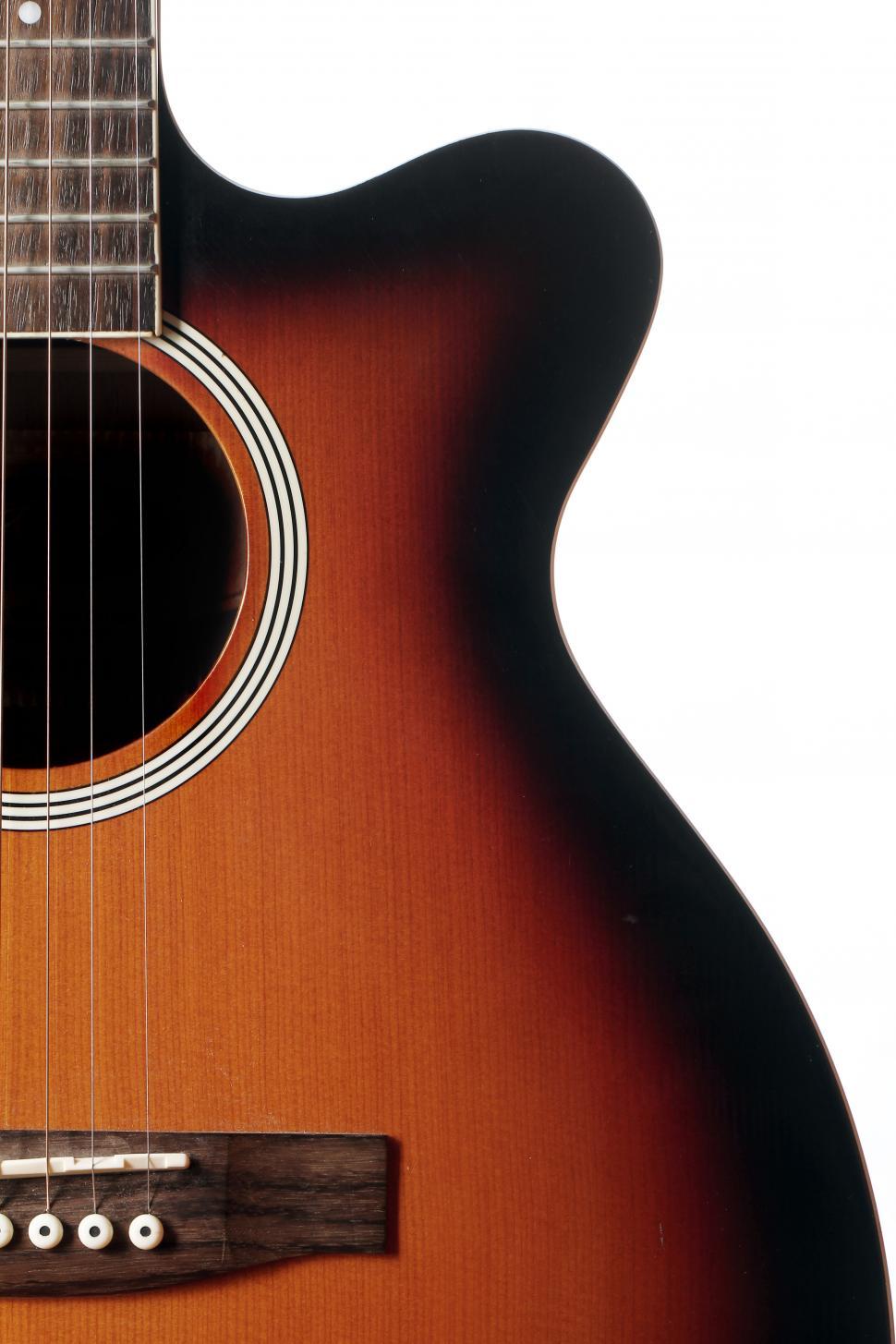 Free Image of Silhouette of classic acoustic guitar, unconventional shape 