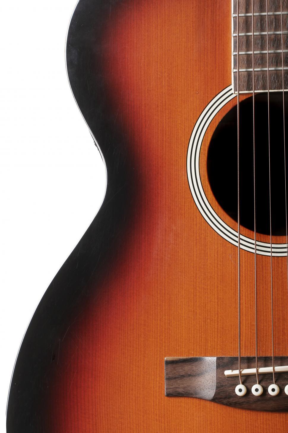 Free Image of Classic acoustic guitar shape and strings close up 