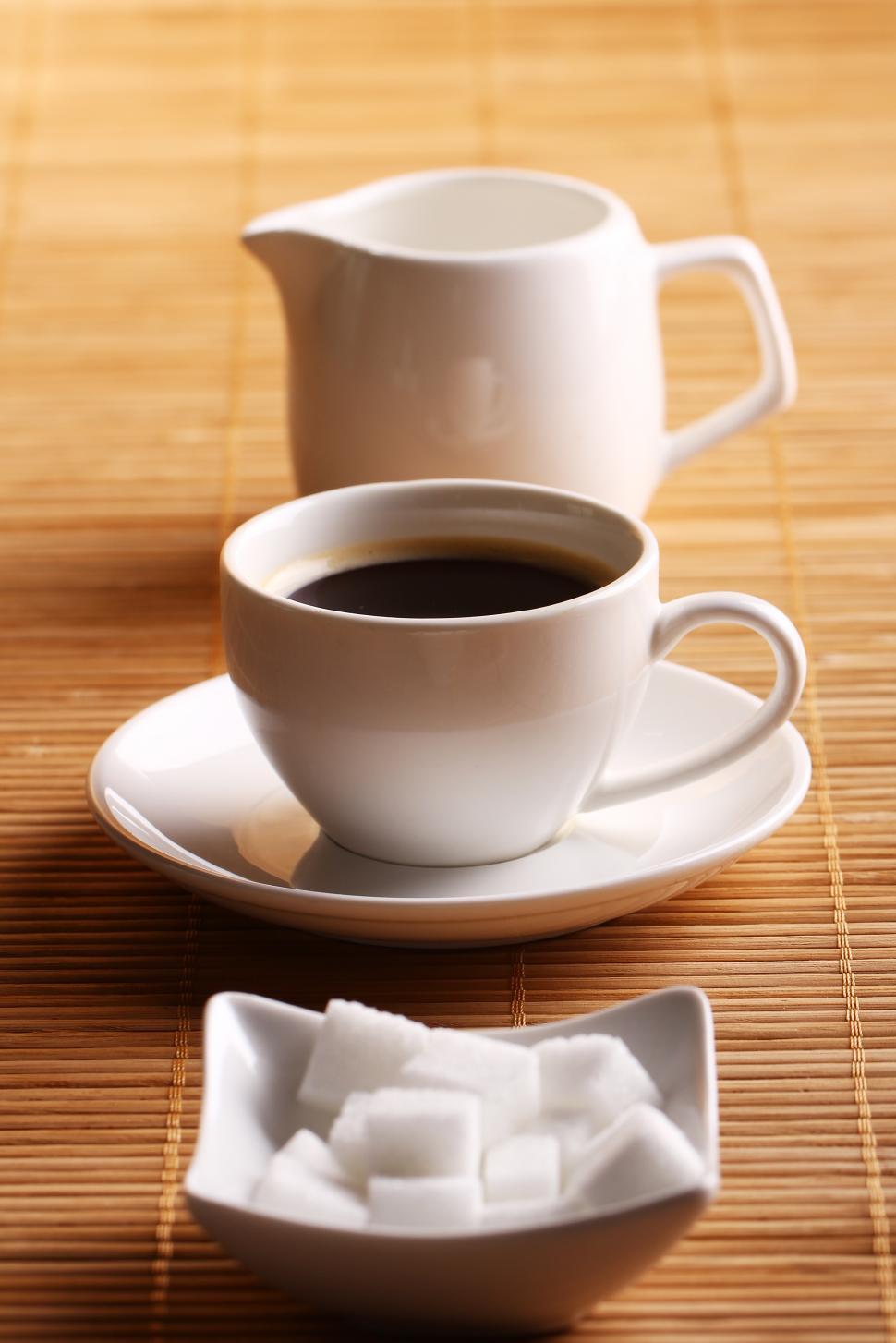 Free Image of Cup of coffee with sugar and cream 