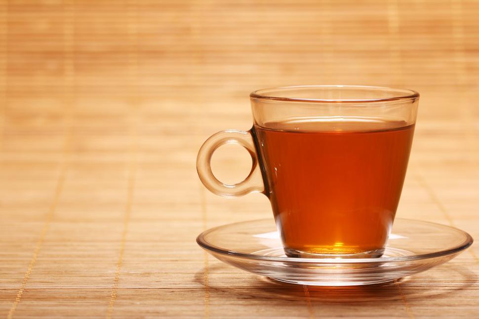 Free Image of Hot and fresh tea in glass mug with saucer 
