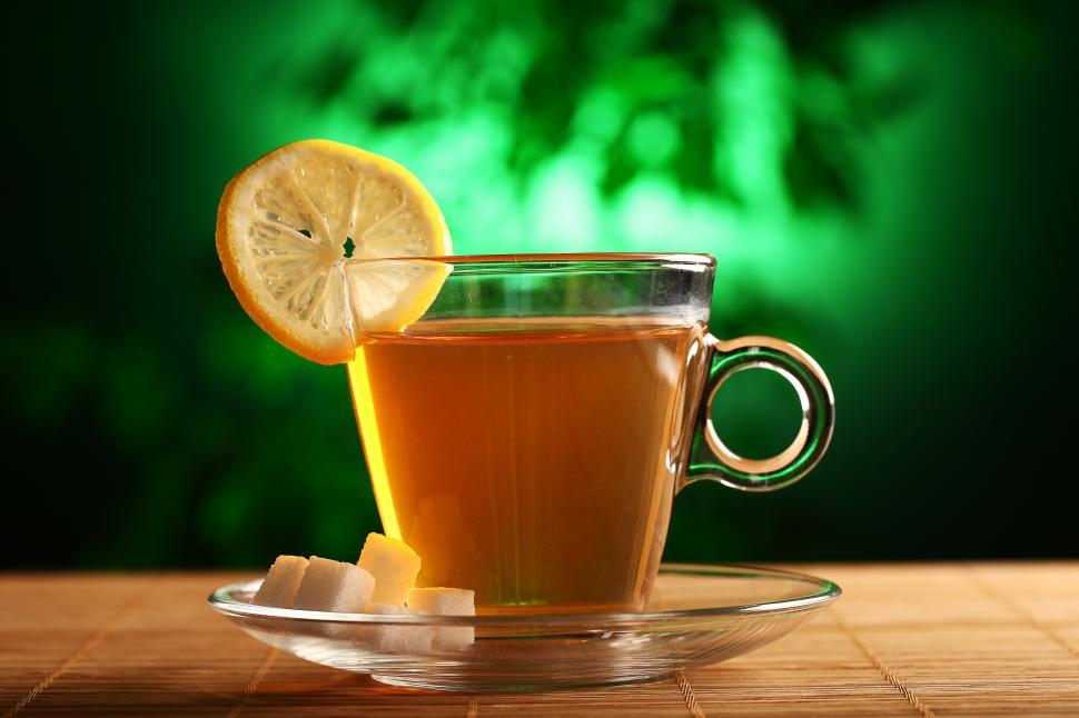 Free Image of Cup of hot green tea with sugar and lemon 